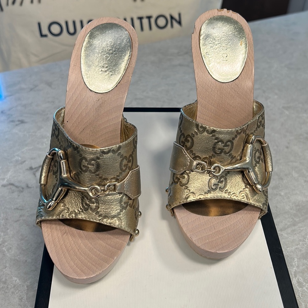 Gucci!. GOLD💛Gucci GOLD open toe wooden heels.